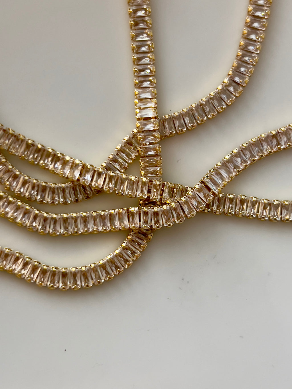 Gold baguette tennis