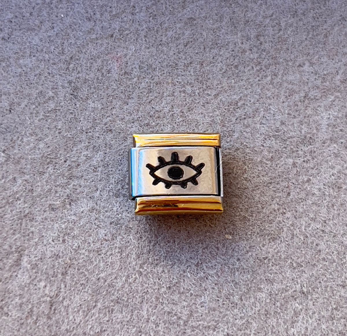 Evil eye charm