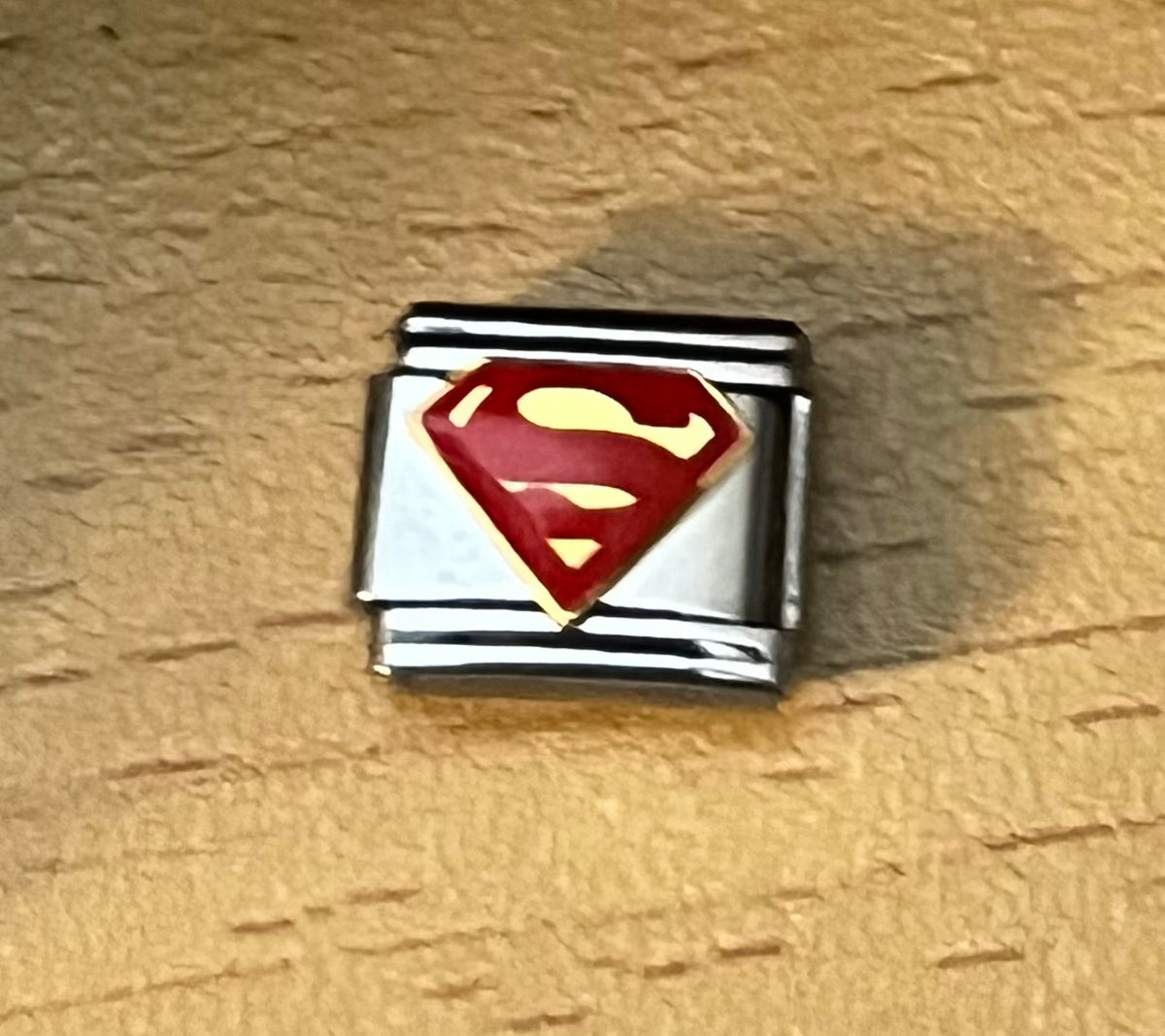 Superman charm